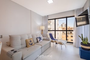 Basic Apartment | Living area | 32-inch Smart TV with digital channels