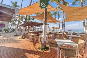 Outdoor dining - Beachfront 1 BR Condo with Multiple Pools - Gym (Puerto Vallarta)