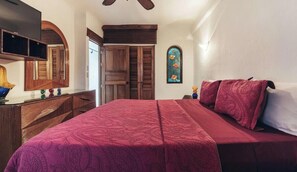 1 bedroom, desk, iron/ironing board, travel crib