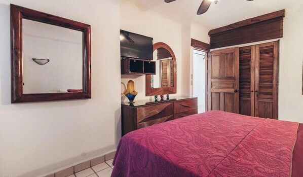 1 bedroom, desk, iron/ironing board, travel crib