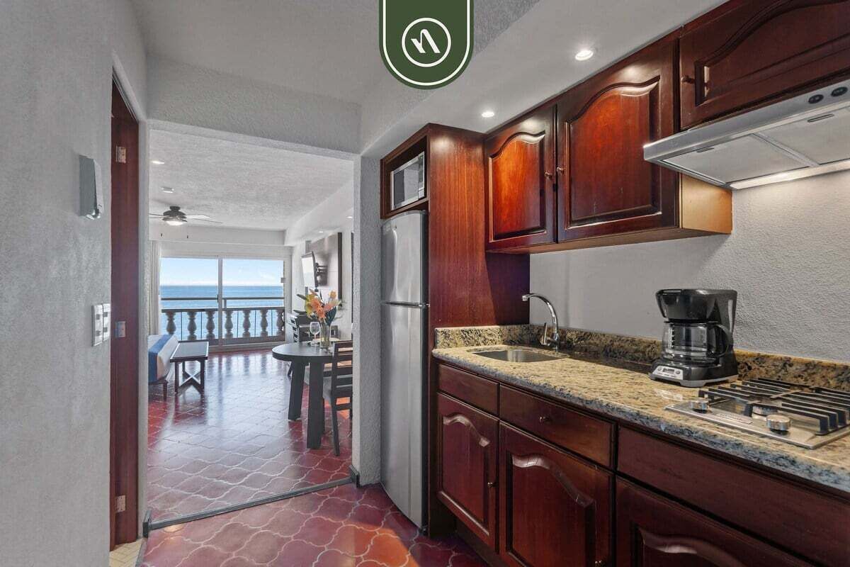 Fridge, microwave, stovetop, coffee/tea maker