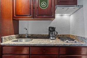 Fridge, microwave, stovetop, coffee/tea maker