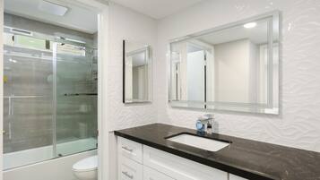 Hair dryer, towels, soap, toilet paper
