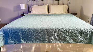 1 bedroom, desk, iron/ironing board, travel crib