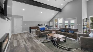 Smart TV, fireplace, table football