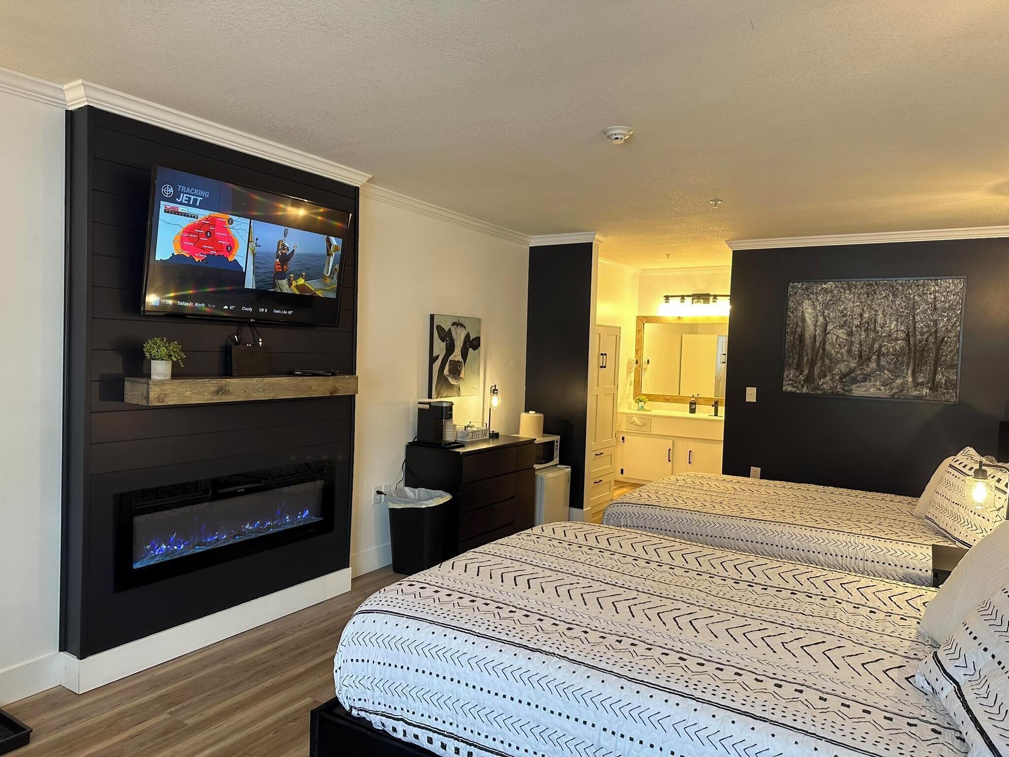 Legends Fountain View unit 109 fireplace with two queen beds