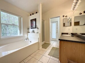 Shower, hair dryer, towels, toilet paper