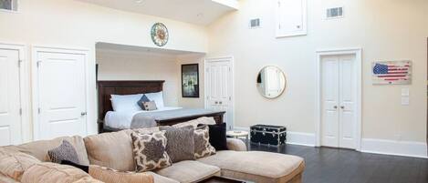 1 bedroom, desk, iron/ironing board, travel crib