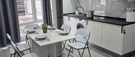 Fridge, microwave, toaster, cookware/dishes/utensils