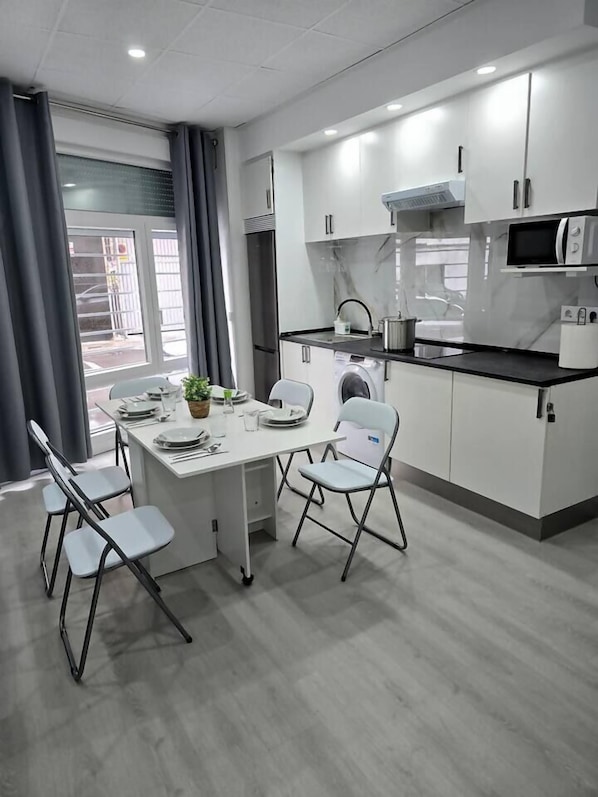 Fridge, microwave, toaster, cookware/dishes/utensils