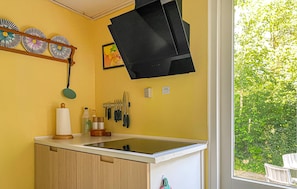 Fridge, stovetop, coffee/tea maker, cookware/dishes/utensils