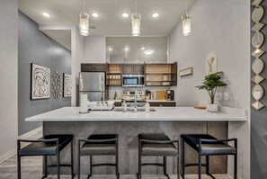 Fridge, microwave, oven, stovetop - Luxe Flat w/ Heated Pool & Sauna • Gym•Heart of DT (Cleveland)