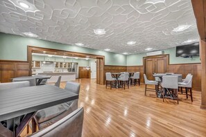 A spacious dining area with wooden flooring and modern ceiling design. - Central Flat w/ Pool & Sauna • Gym•Heart of DT (Cleveland)