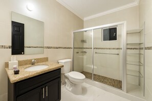 Shower, towels, soap, toilet paper