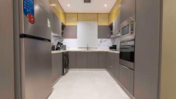 Apartemen (2 Bedrooms) | Dapur bersama | Lemari es, microwave, dan oven