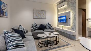 Apartment (1 Bedroom) | Living area | TV