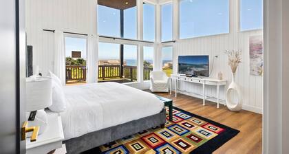 Spacious home with ocean view, enclosed yard, fireplace, hut tub, washer & dryer