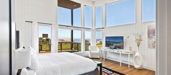 Spacious home with ocean view, enclosed yard, fireplace, hut tub, washer & dryer