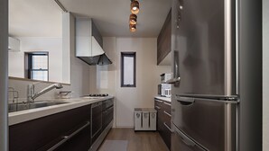 A modern kitchen with stainless steel appliances, a built-in oven, and a microwave. - 福助Tofu   OsakaTsuruhashi 5mins JRloop Direct Nipponbashi;Namba;Nara;USJ;Tennoji  (Ikuno-ku Tsuruhashi)