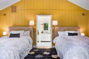 A room with two beds, a bathroom, and a view through a door. - Sonoma/Napa Wine Country Getaway (Sonoma)