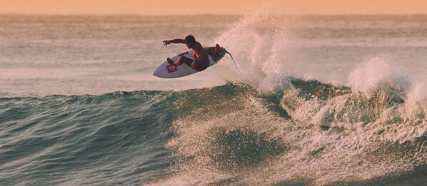A surfer riding a wave.