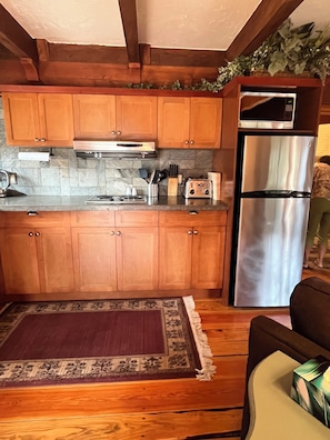 Fridge, microwave, stovetop, coffee/tea maker