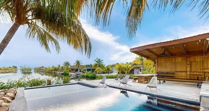 Waterfront villa with splash pool, private terrace, beach access & WiFi