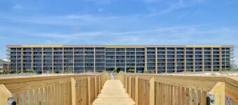 Beachfront condo with pool, private balcony, and washer and dryer