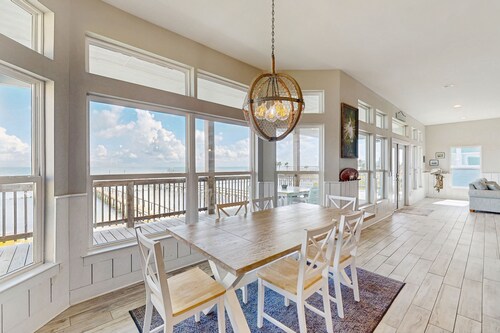 Stunning bay front home with fishing pier, large deck, & private pool