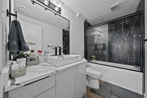 Hair dryer, towels, soap, toilet paper