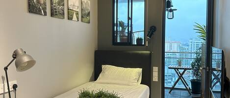 1 غرفة نوم ومكواة/لوح كي وخدمة الإنترنت وملاءات أسرّة