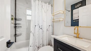 Hair dryer, towels, soap, toilet paper
