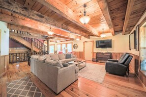 TV, fireplace, books