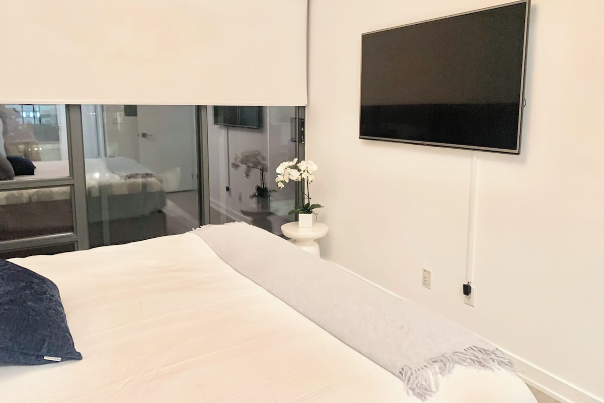 Chambre Deluxe avec lits jumeaux | Bureau, fer et planche Ă repasser, Wi-Fi gratuit, draps fournis