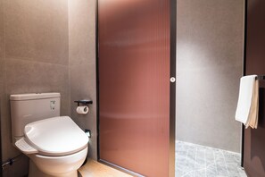 Business Twin Room | Bathroom | Shower, hair dryer, slippers, towels