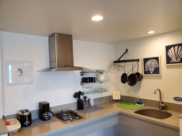 Fridge, microwave, coffee/tea maker, toaster