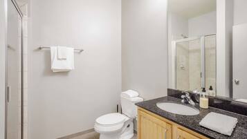 Combined shower/bathtub, hair dryer, towels, soap