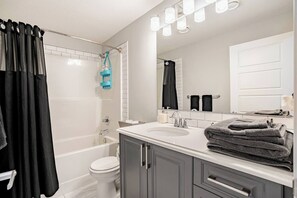 Hair dryer, towels, soap, shampoo