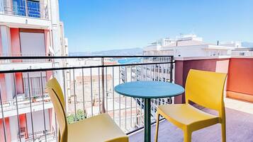 Luxury Double Room, Partial Sea View | In-room safe, desk, iron/ironing board, free WiFi