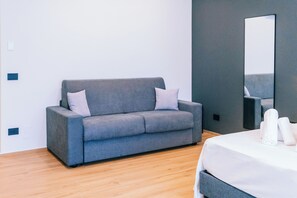 Superior Double Room, Partial Sea View | In-room safe, desk, iron/ironing board, free WiFi