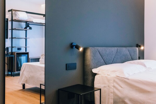 Superior Double Room, Partial Sea View | In-room safe, desk, iron/ironing board, free WiFi