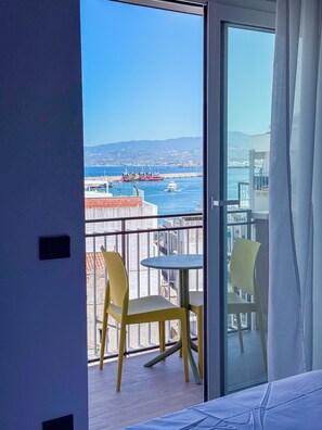 Luxury Double Room, Partial Sea View | In-room safe, desk, iron/ironing board, free WiFi