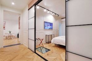 2 bedrooms, desk, iron/ironing board, travel crib
