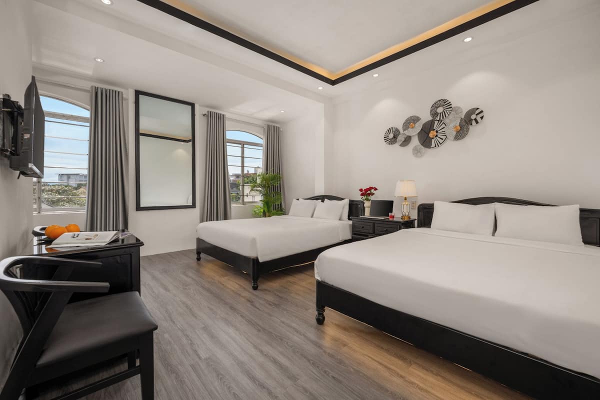 Family Quadruple Room | Minibar, laptop workspace, free WiFi, bed sheets