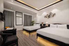 Family Quadruple Room | Minibar, laptop workspace, free WiFi, bed sheets