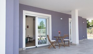 ファミリー トリプルルーム エンスイート ガーデンビュー | テラス / パティオ