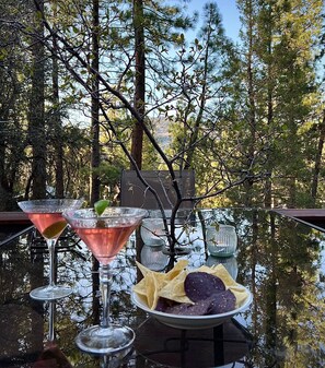 Outdoor dining - The Wilkie Cabin ~ Calming home hideaway in the woods with fireplace, balcony, grill, & board games (Big Bear)