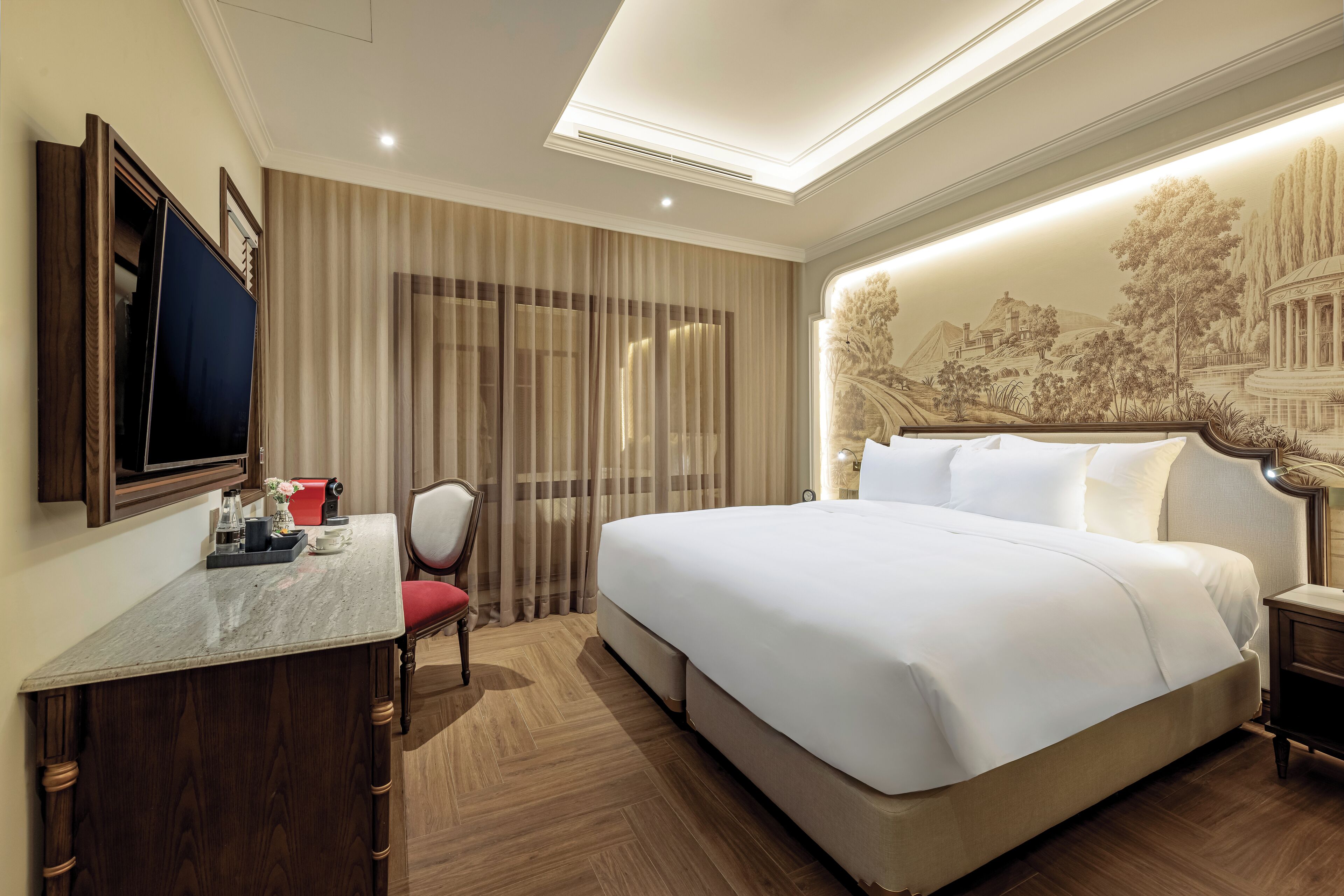 Deluxe Room with Internal Window | Minibar, caja de seguridad en la habitación y escritorio 