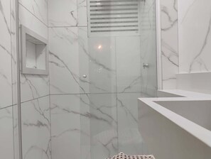 Shower, towels, soap, toilet paper
