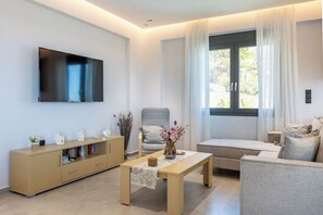 Vila Keluarga | Area keluarga | Smart TV 55-inci dengan saluran TV digital